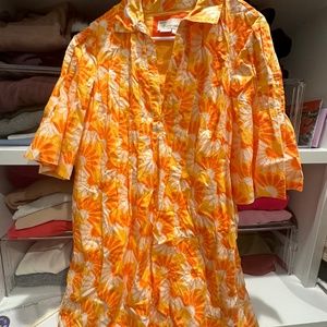 Cute little mini dress. All cotton, lightweight but not see through